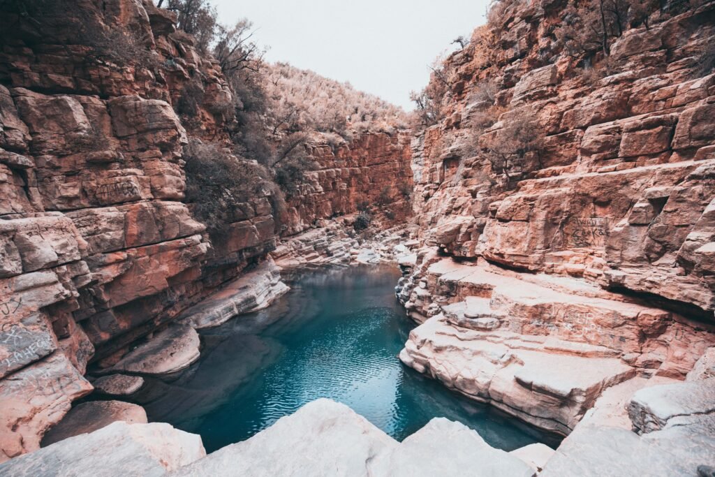 small-lake-inside-canyon-near-rock-formations-paradise-valley-morocco-africa-min